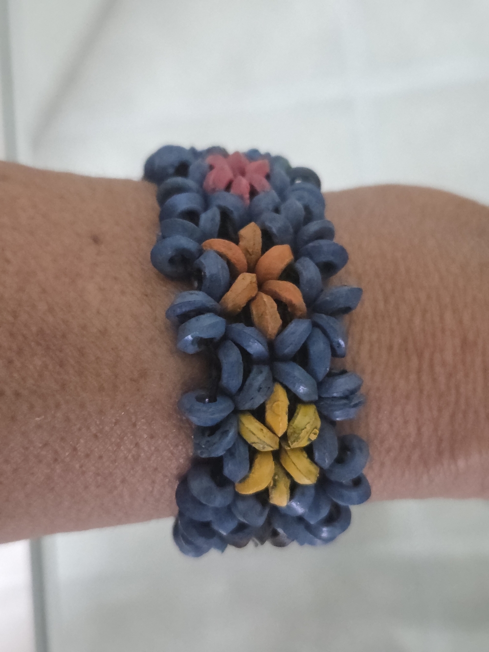 Handmade Blue Floral Bead Bracelet with Yellow and Orange Accents